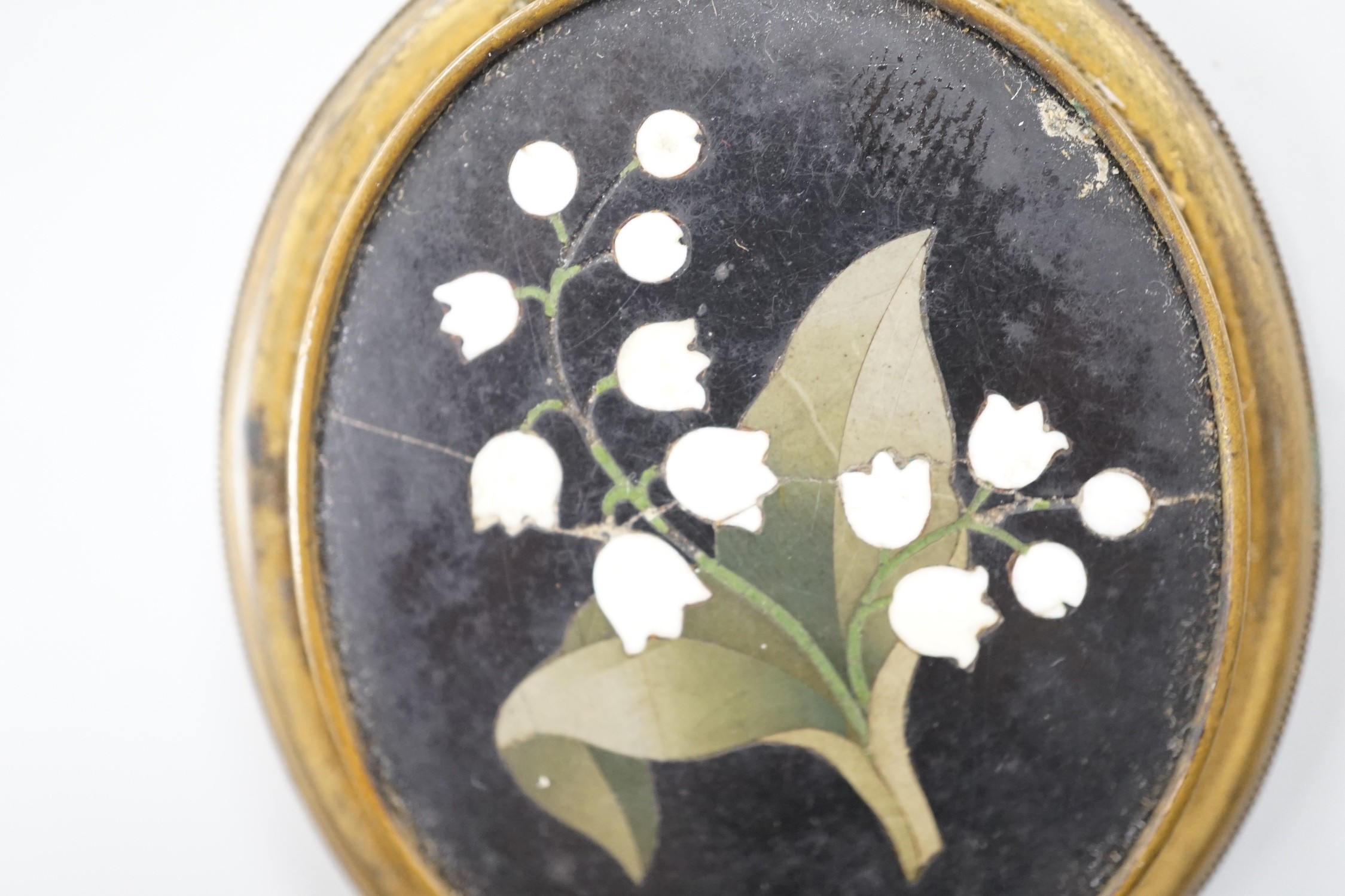 A gilt metal and Pietra Dura set oval brooch, 60mm.